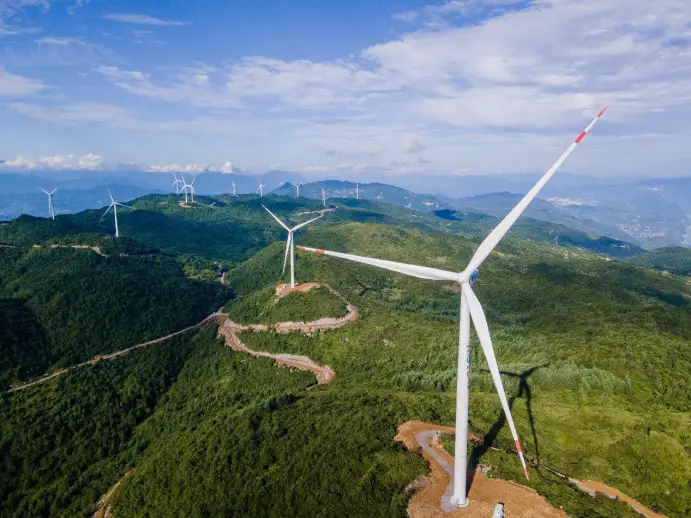 Photo taken on July 23, 2022 shows a wind farm in Wushan county, southwest China's Chongqing municipality. (Photo by Wang Changzheng/People's Daily Online)