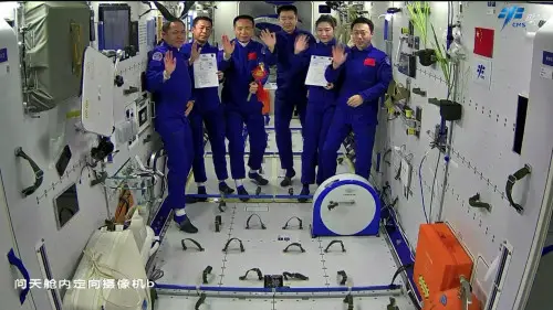 The Shenzhou-14 and Shenzhou-15 crew pose for a group photo on China's space station on Dec. 2, 2022. (Photo from the website of China manned space engineering)