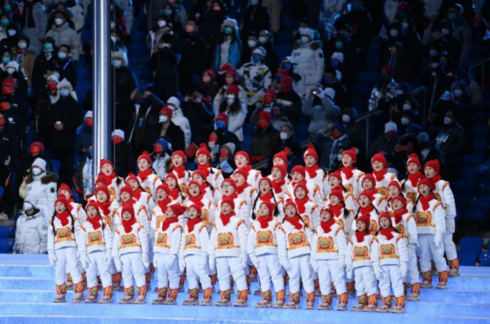 Members of a children's choir sing the Olympic Anthem during the opening ceremony of the Beijing 2022 Olympic Winter Games at the National Stadium in Beijing. (Xinhua/Li Ga)