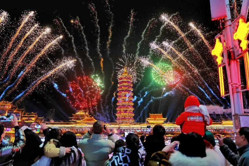 A firework show is performed in Huzhou, east China's Zhejiang province, Jan. 27, 2023. (Photo by Zhou Wei/People's Daily Online)