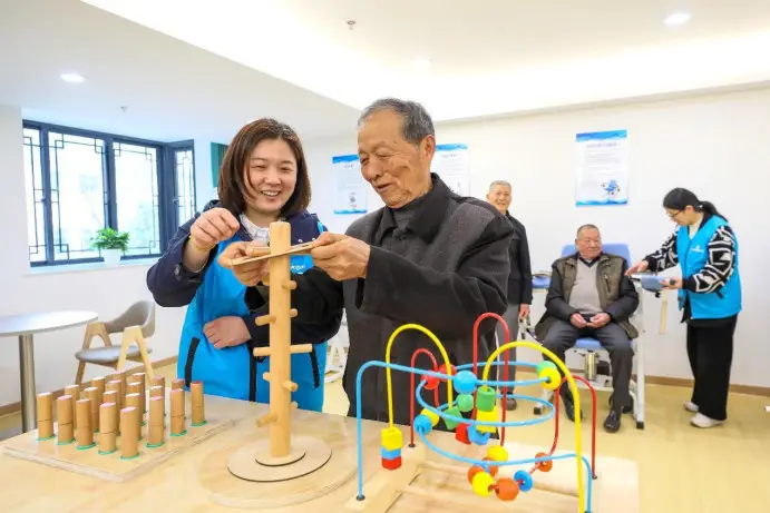 Photo shows an activity room of a nursing home in Deqing county, Huzhou, east China's Zhejiang province. (Photo by Bai Yu/People's Daily Online)