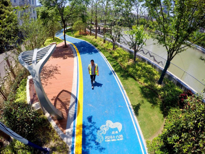 Photo shows a fitness trail along the Suzhou River in Putuo district, Shanghai. (Photo by Yang Jianzheng/People's Daily Online)