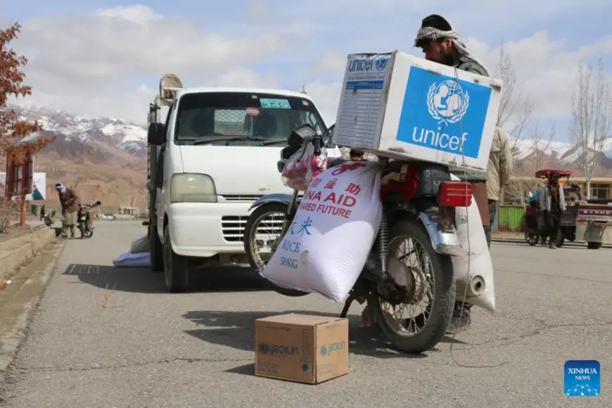 Afghans receive China-donated humanitarian aid and assistance provided by the United Nations Children's Fund (UNICEF) to needy families in Bamyan Province, Afghanistan, April 3, 2023. Afghan authorities have distributed China-donated humanitarian aid and assistance provided by the UNICEF to needy families in the country's central Bamyan province over the past week, an official said on Monday. (Photo by Ziaodin Azad/Xinhua)