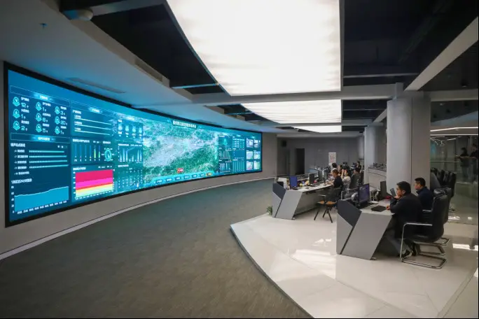 Photo taken on April 13, 2023 shows the control center of an intelligent urban management platform in the Rongjiang New Area, Ganzhou, east China's Jiangxi province. (Photo by Zhong Wanshan/People's Daily Online)