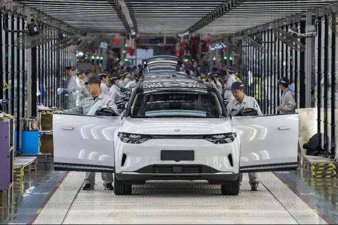 New energy vehicles roll off the line in a smart workshop of Chinese carmaker Leapmotor in Jinhua, east China's Zhejiang province. (Photo by Hu Xiaofei/People's Daily Online)
