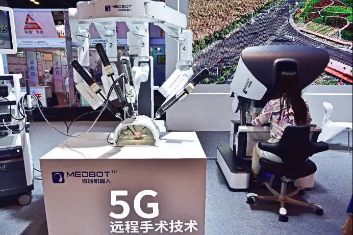 A minimally invasive surgical robot is exhibited at the 9th China (Shanghai) International Technology Fair in east China's Shanghai, June 15, 2023. (Photo by Zhou Dongchao/People's Daily Online)