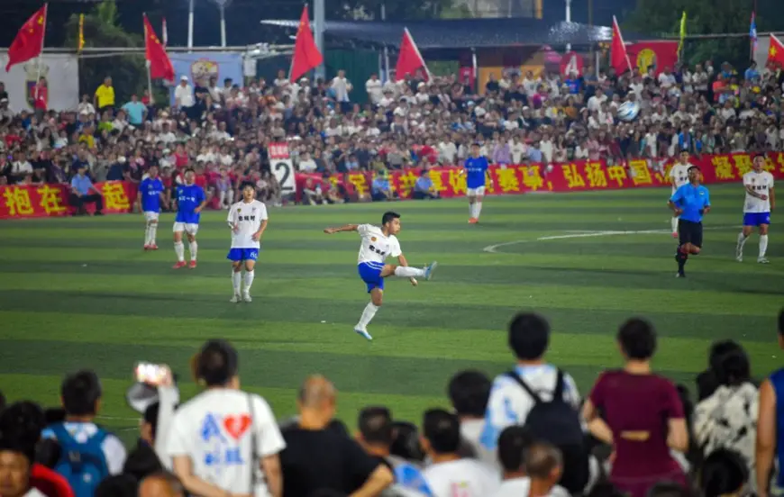 The final of a rural soccer league is held in Rongjiang county, Qiandongnan Miao and Dong autonomous prefecture, southwest China's Guizhou province, July 29, 2023. (Photo by Jia Zhi/People's Daily Online)