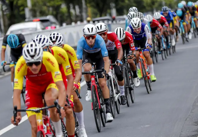 Cyclers compete in the Tour of Huangshan 2023 international road biking event in east China's Anhui province, July 23. (Photo by Shi Yalei/People's Daily Online)