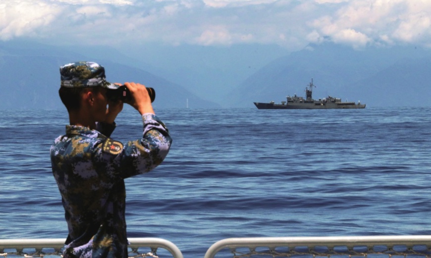 A PLA soldier looks around with a telescope on August 5, 2022, as the Navy of the PLA Eastern Theater Command continues drills the waters around the island of Taiwan. Photo: Xinhua A PLA soldier looks around with a telescope on August 5, 2022, as the Navy of the PLA Eastern Theater Command continues drills the waters around the island of Taiwan. Photo: Xinhua