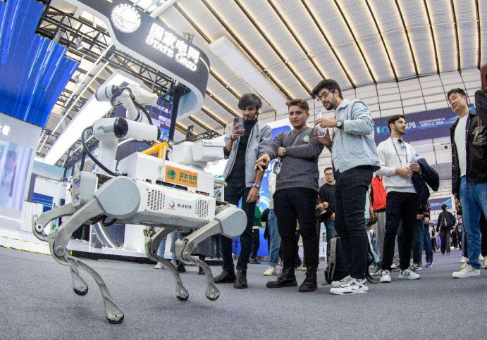 A robot is exhibited at the Light of Internet Expo of the 2023 World Internet Conference Wuzhen Summit in Wuzhen, east China's Zhejiang province, Nov. 7, 2023. (Photo by Zhai Huiyong/People's Daily Online) A robot is exhibited at the Light of Internet Expo of the 2023 World Internet Conference Wuzhen Summit in Wuzhen, east China's Zhejiang province, Nov. 7, 2023. (Photo by Zhai Huiyong/People's Daily Online)