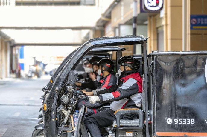 Couriers are ready to deliver parcels at a distribution station of SF Express in Qianxi, southwest China's Guizhou province. (Photo by Fan Hui/People's Daily Online) Couriers are ready to deliver parcels at a distribution station of SF Express in Qianxi, southwest China's Guizhou province. (Photo by Fan Hui/People's Daily Online)