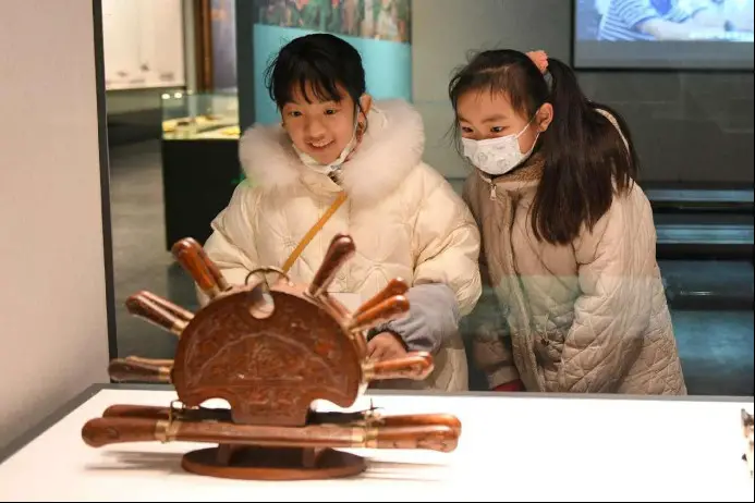 People visit a special exhibition of cultural relics related to the Gulangyu Island at the Changzhou Museum, east China's Jiangsu province, Feb. 25, 2023. (Photo by Shi Kang/People's Daily Online)