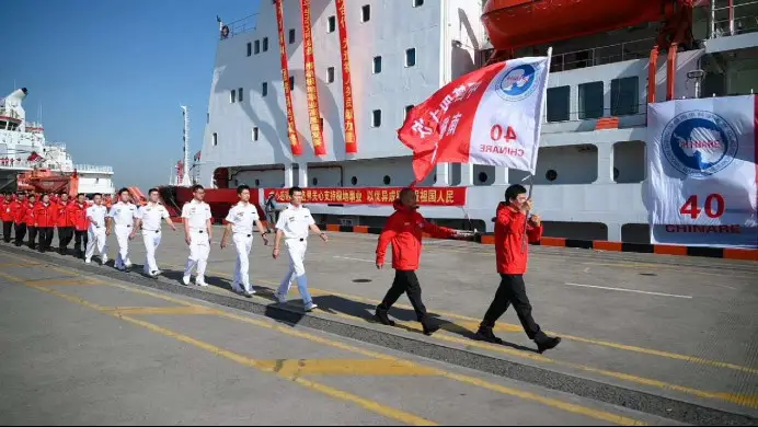 Members of China's 40th Antarctic scientific expedition team get aboard in east China's Shanghai, Nov. 1, 2023. (Photo by Shen Chunchen/People's Daily Online)