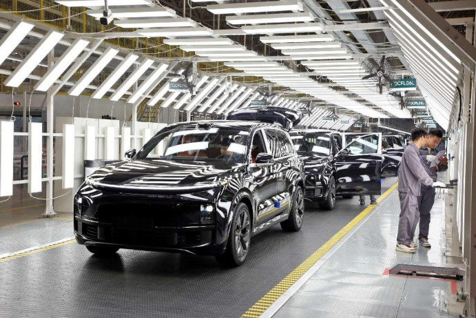 New energy vehicles go through quality check at a production base of Chinese carmaker Li Auto in Changzhou, east China's Jiangsu province. (Photo by Chen Wei/People's Daily Online) New energy vehicles go through quality check at a production base of Chinese carmaker Li Auto in Changzhou, east China's Jiangsu province. (Photo by Chen Wei/People's Daily Online)