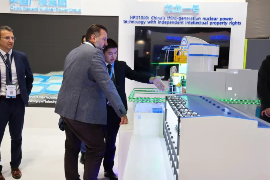 A model of Hualong One, a domestically designed third-generation nuclear reactor, is exhibited at the booth of China General Nuclear Power Group at the fifth edition of the World Nuclear Exhibition held in Paris, France in November 2023. (Photo by Shang Kaiyuan/People's Daily)