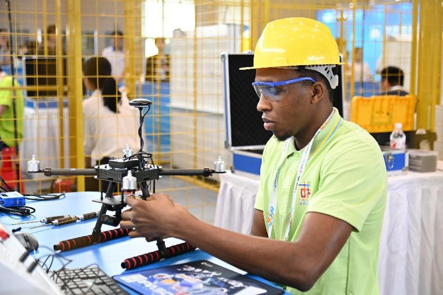 A competitor competes in drone assembly and troubleshooting during the second Belt and Road International Skills Competition at the Chongqing International Expo Center, southwest China's Chongqing municipality, June 25, 2024. (Photo by Sun Kaifang/People's Daily Online) A competitor competes in drone assembly and troubleshooting during the second Belt and Road International Skills Competition at the Chongqing International Expo Center, southwest China's Chongqing municipality, June 25, 2024. (Photo by Sun Kaifang/People's Daily Online)