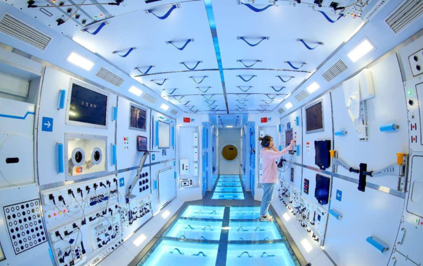 A local citizen visits a 1:1 replica of the Tianhe core module of China's space station at an aerospace science popularization center in Hebi, central China's Henan province. (Photo by Zhang Jingang/People's Daily Online) A local citizen visits a 1:1 replica of the Tianhe core module of China's space station at an aerospace science popularization center in Hebi, central China's Henan province. (Photo by Zhang Jingang/People's Daily Online)