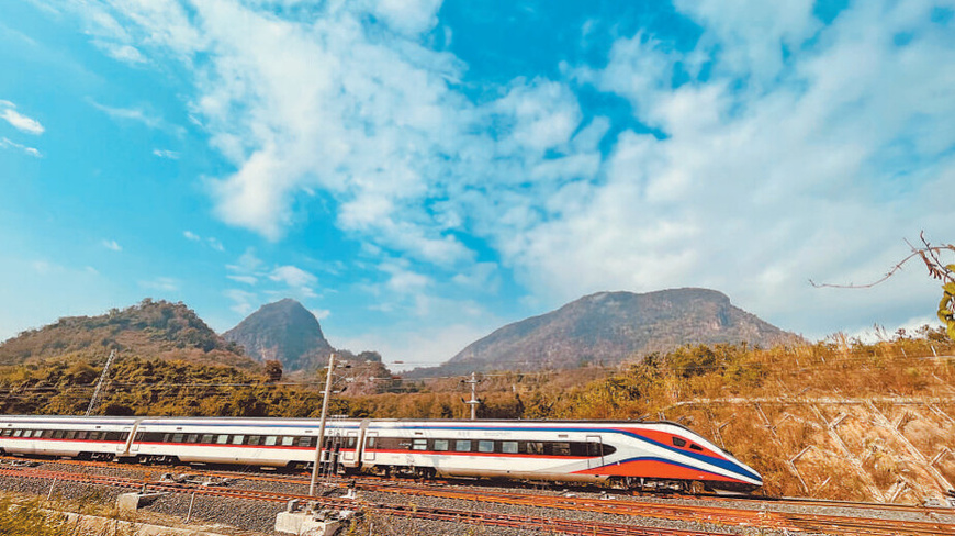 A Lancang-Mekong Express train runs on the China-Laos Railway in Luang Prabang, Laos. (Photo by Sun Guangyong/People's Daily) A Lancang-Mekong Express train runs on the China-Laos Railway in Luang Prabang, Laos. (Photo by Sun Guangyong/People's Daily)