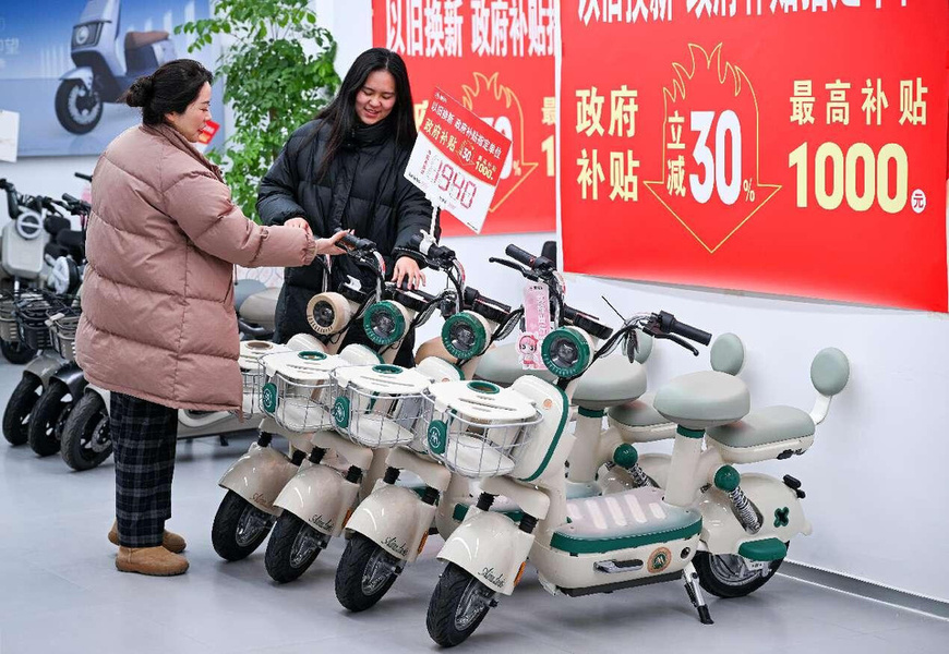 Citizens buy electric vehicles in a store in Suqian, east China's Jiangsu province, March 4, 2025. (Photo by Fang Dongxu/People's Daily Online) Citizens buy electric vehicles in a store in Suqian, east China's Jiangsu province, March 4, 2025. (Photo by Fang Dongxu/People's Daily Online)