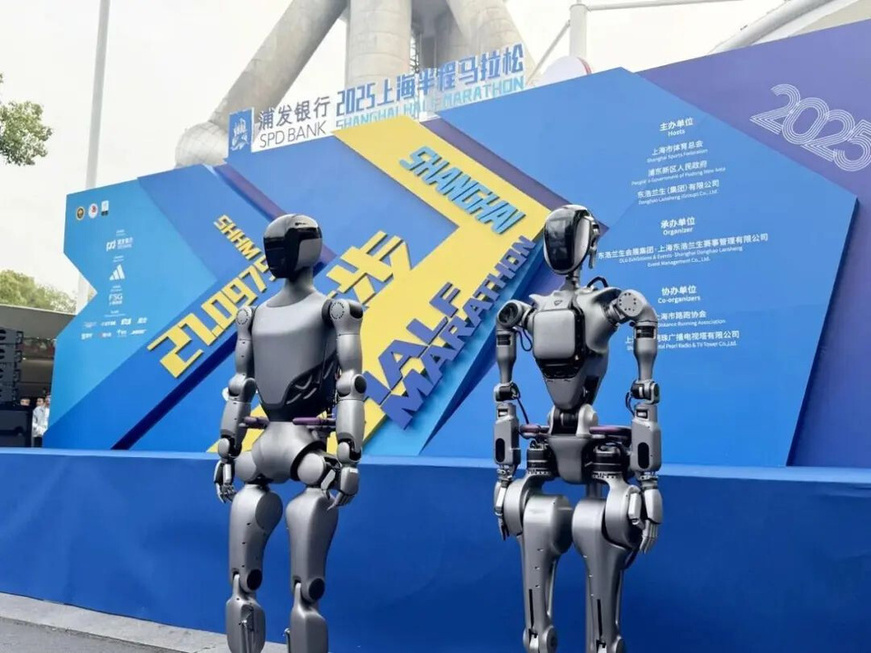 Humanoid robots GR-1 and GR-2 developed by Shanghai-based tech firm Fourier join the 2025 Shanghai Half Marathon. (Photo from the official account of the Shanghai Municipal Commission of Economy and Informatization on WeChat) Humanoid robots GR-1 and GR-2 developed by Shanghai-based tech firm Fourier join the 2025 Shanghai Half Marathon. (Photo from the official account of the Shanghai Municipal Commission of Economy and Informatization on WeChat)