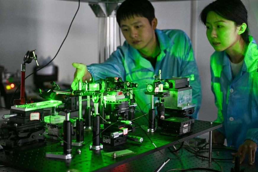 In a laboratory of QuantumCTek Co., Ltd. in Hefei, east China's Anhui province, researchers are calibrating a quantum diamond probe scanner. (Photo by Huang Yangyang/People's Daily Online) In a laboratory of QuantumCTek Co., Ltd. in Hefei, east China's Anhui province, researchers are calibrating a quantum diamond probe scanner. (Photo by Huang Yangyang/People's Daily Online)