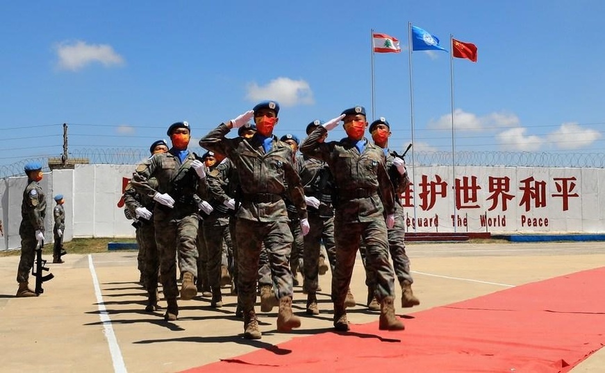 In this file photo dated July 1, 2022, Chinese peacekeepers march during a medal parade ceremony in Hanniyah village, southern Lebanon. (PHOTO / XINHUA) In this file photo dated July 1, 2022, Chinese peacekeepers march during a medal parade ceremony in Hanniyah village, southern Lebanon. (PHOTO / XINHUA)