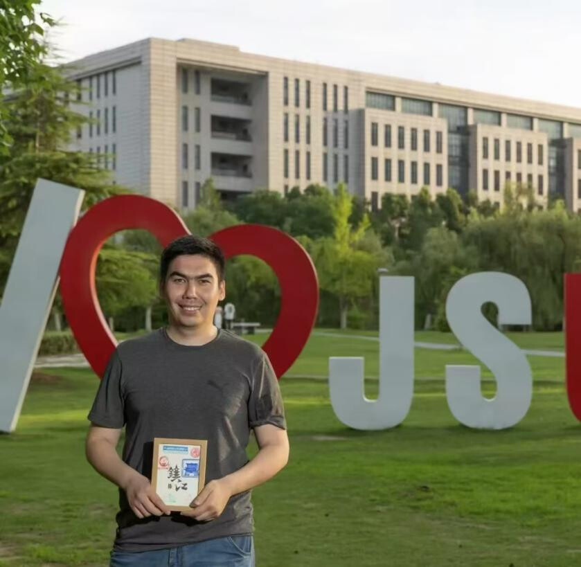 Abdulkhakimov Jaloluddin , a master's student from Uzbekistan, stands on the campus of Jiangsu University, fulfilling a three-generation dream of friendship with China that began with his grandfather during World War II. (Photo provide by Abdulkhakimov Jaloluddin) Abdulkhakimov Jaloluddin , a master's student from Uzbekistan, stands on the campus of Jiangsu University, fulfilling a three-generation dream of friendship with China that began with his grandfather during World War II. (Photo provide by Abdulkhakimov Jaloluddin)