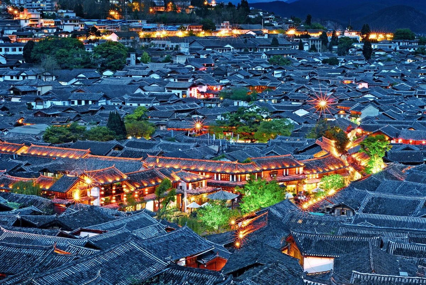 Photo shows an aerial view of Lijiang ancient town. (Photo/Tang Xinrong)