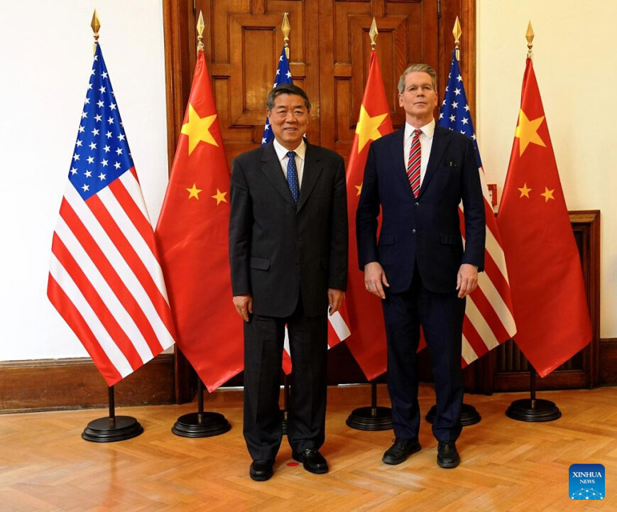 Chinese Vice Premier He Lifeng, also a member of the Political Bureau of the Communist Party of China Central Committee, poses for a photo with U.S. Treasury Secretary Scott Bessent prior to their talks in Madrid, Spain, Sept. 14, 2025. The Chinese and U.S. delegations convened here on Sunday for talks on economic and trade issues. (Xinhua/Xing Guangli) Chinese Vice Premier He Lifeng, also a member of the Political Bureau of the Communist Party of China Central Committee, poses for a photo with U.S. Treasury Secretary Scott Bessent prior to their talks in Madrid, Spain, Sept. 14, 2025. The Chinese and U.S. delegations convened here on Sunday for talks on economic and trade issues. (Xinhua/Xing Guangli)