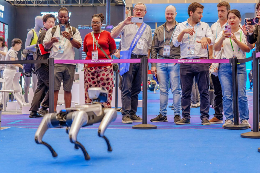 A robotic dog manufactured by a tech firm is exhibited at the 138th edition of the China Import and Export Fair, or the Canton Fair in Guangzhou, south China's Guangdong province, Oct. 17, 2025. (Photo/Huang Taiming)