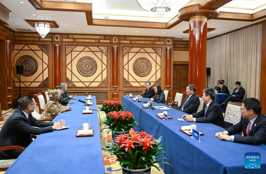Chinese Vice Premier He Lifeng, also a member of the Political Bureau of the Communist Party of China Central Committee, meets with Director-General of the World Trade Organization (WTO) Ngozi Okonjo-Iweala in Beijing, capital of China, Dec. 9, 2025. (Xinhua/Zhang Ling)