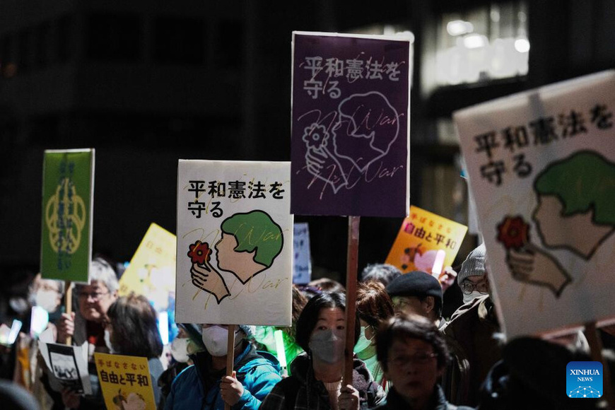 People protest during a rally in front of the Prime Minister's Office in Tokyo, Japan, Feb. 27, 2026. In a policy speech on Feb. 20, Japanese Prime Minister Sanae Takaichi reiterated her strong determination to revise the Constitution and outlined plans to fundamentally strengthen Japan's defense capabilities, expand exports of lethal weapons and enhance national intelligence functions, which have sparked criticism and concerns across Japanese society. (Xinhua/Jia Haocheng)