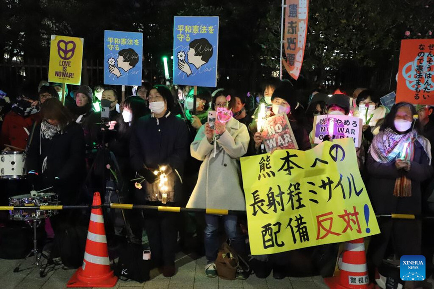 Demonstrators attend a rally outside the National Diet in Tokyo, Japan, March 10, 2026. Nearly 10,000 people gathered in central Tokyo on Tuesday night to protest the dangerous policies pursued by the government of Japanese Prime Minister Sanae Takaichi, including the deployment of missiles and the push to ease lethal arms exports. (Xinhua/Li Ziyue)