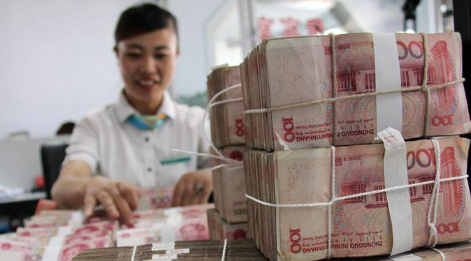 Central bank governor urges not to overreact to China’s forex stockpile