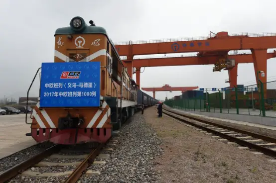 Carting small commodities, clothing and other goods, China-Europe Railway Express No. X8024 (Yiwu-Madrid) trundled out of Yiwu West Station on May 13, 2017, a day before the Belt and Road Forum for International Cooperation kicked off. It was embarking on the 1,000th trip along the railroad freight line this year. A total of 612 more trips have been seen this year, up 158% compared with the same period last year. (Photo by People.cn)