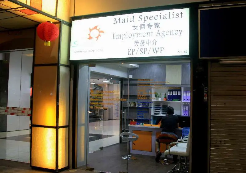 Caption: A maid employment agency near Orchard road in Singapore. Photo: Yu Yichun
