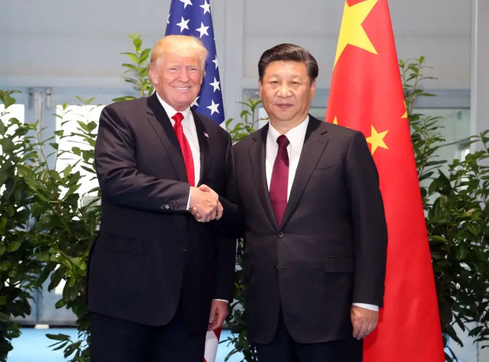 Chinese President Xi Jinping (R) meets with his US counterpart Donald Trump on the sidelines of a Group of 20 (G20) summit, in Hamburg, Germany, July 8, 2017. The two heads of state exchanged in-depth views on bilateral ties and global hot-spot issues. (Xinhua/Yao Dawei)