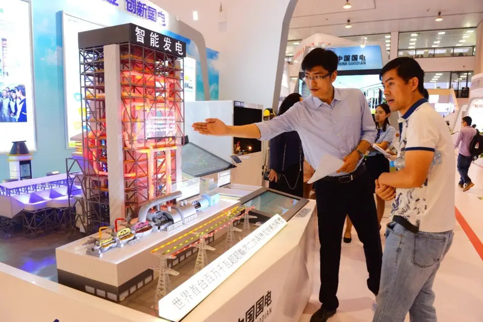 The scale model of the world’s first GW double reheat ultra supercritical unit is exhibited in Beijing, Sept. 18, 2017. China’s central SOEs were awarded over 400 national sci&tech prizes since the 18th CPC National Congress and owned more than 480,000 patents in total. (Photo from CFP)
