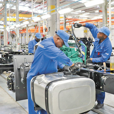 African employees work on an auto production line at a factory of China’s FAW Group in city of Nelson Mandela Bay, South Africa. (Photo by Liu Lingling from People’s Daily) African employees work on an auto production line at a factory of China’s FAW Group in city of Nelson Mandela Bay, South Africa. (Photo by Liu Lingling from People’s Daily)
