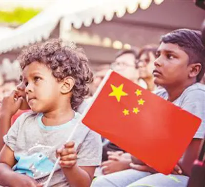 Mauritian children are watching a Chinese show. (File photo)