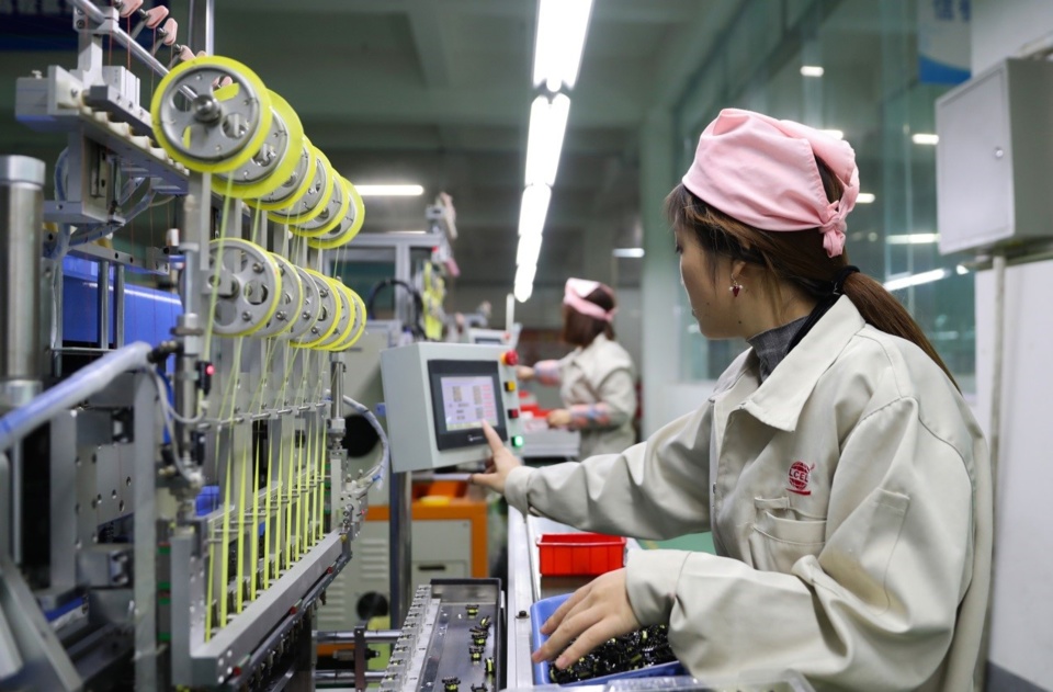 A female worker operates a smart machining tool at an electronics company in an industrial park of Huaying, southwest China’s Sichuan province, Oct. 25, 2018. (Photo from CFP) A female worker operates a smart machining tool at an electronics company in an industrial park of Huaying, southwest China’s Sichuan province, Oct. 25, 2018. (Photo from CFP)