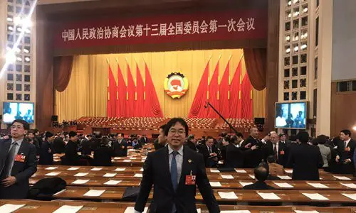 Xu Jingbo, head of the Japan bureau of the Asian News Agency, attended the first session of the 13th CPPCC National Committee in 2018. Photo: Courtesy of Xu Jingbo
