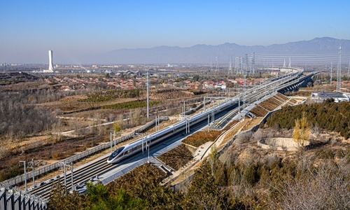 A bullet train tests operations along the high-speed railway line connecting Beijing and Zhangjiakou in North China’s Hebei Province in November, 2019. (Photo by CFP) A bullet train tests operations along the high-speed railway line connecting Beijing and Zhangjiakou in North China’s Hebei Province in November, 2019. (Photo by CFP)