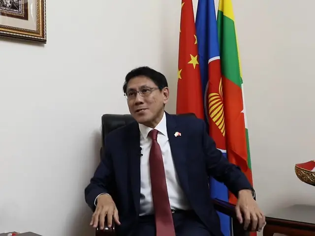 Myanmar Ambassador to China U Myo Thant Pe receives an interview from People's Daily