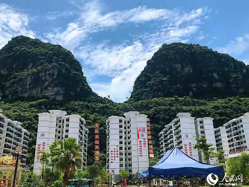Photo taken on August 22, shows a view of the Baxian poverty-relief resettlement site in Chengjiang Township of Du’an Yao Autonomous County, South China's Guangxi Zhuang Autonomous Region. Photo by Du Mingming/ People’s Daily Online