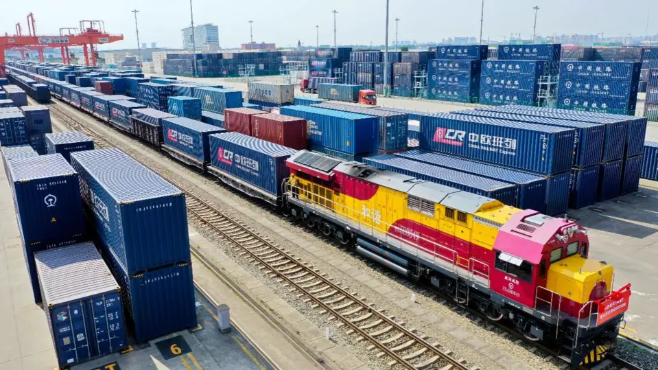 A train loaded with electronic products, daily commodities, medical masks and flowers departs the Chengdu International Railway Port for Tilburg in the Netherlands. It is the 6,000th China-Europe freight train departing Chengdu. Photo by Bai Guibin/People's Daily Online