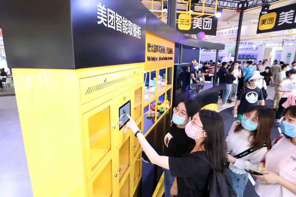 A smart food delivery cabinet is exhibited at the 2020 China International Fair for Trade in Services held in Beijing, Sept. 8, 2020. (Photo by Chen Xiaogen/People's Daily Online)