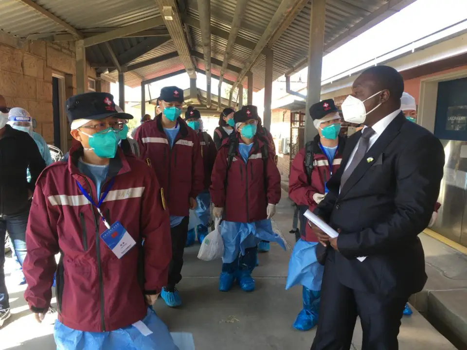 Photo taken on Sept. 30, 2020, shows members of a medical expert team sent by Chinese government to Lesotho sharing experience in fighting the COVID-19 pandemic with local medical workers in a designated hospital for the treatment of COVID-19 patients in Lesotho. (Photo/Courtesy of the Chinese medical expert team sent to Lesotho)