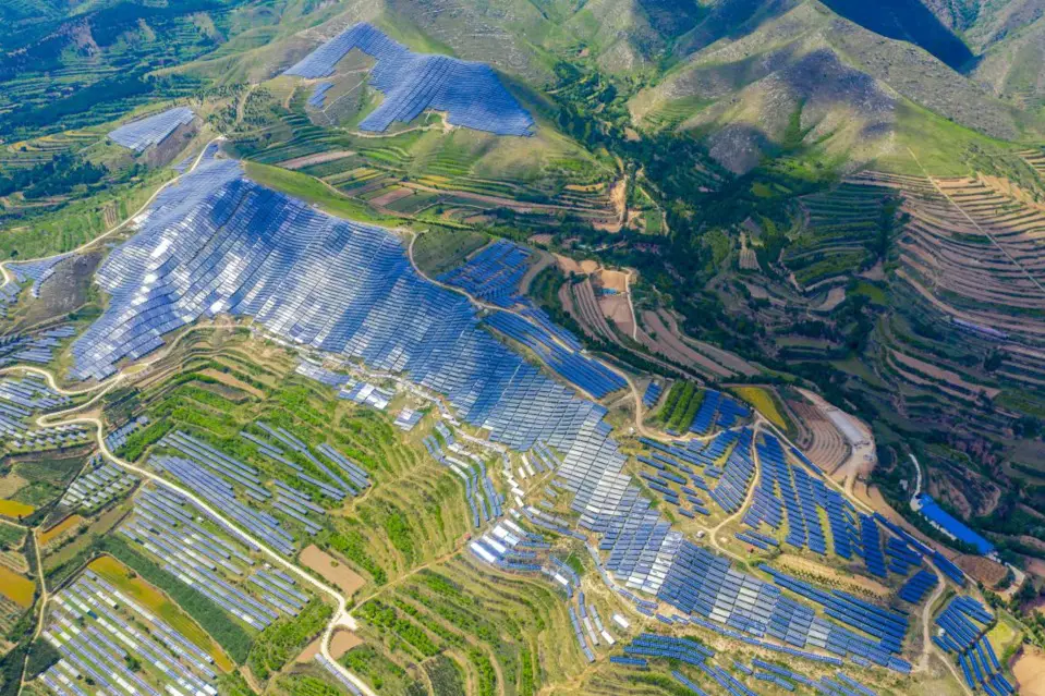 Aerial photo taken on May 23, 2020, shows photovoltaic solar panels in Ruicheng county, Yuncheng, north China’s Shanxi province. (Photo by Yang Jianfeng/People’s Daily Online)