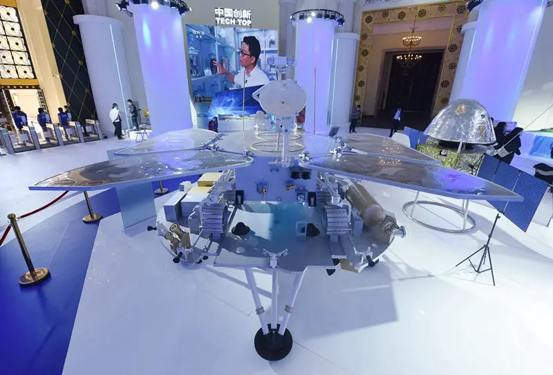 Photo taken on Oct. 30, 2020, shows models of the lander and rover of China’s first Mars probe Tianwen-1 exhibited at the 2020 Global Technology Transfer Fair held in east China’s Shanghai. (Photo by Long Wei/People’s Daily Online)